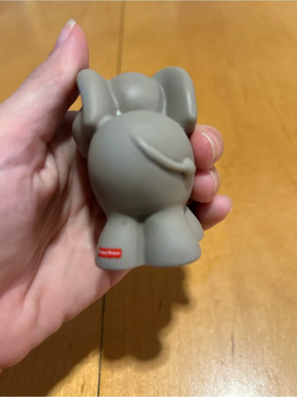 Fisher-Price Gray Elephant Squeeze Toy with White Toenails and Pink Tongue